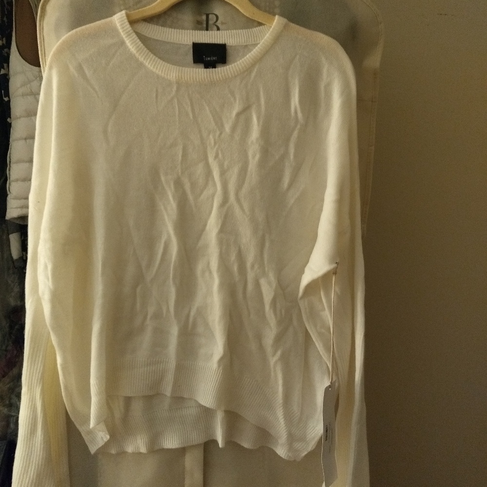 Soft white sweater with bell sleeves